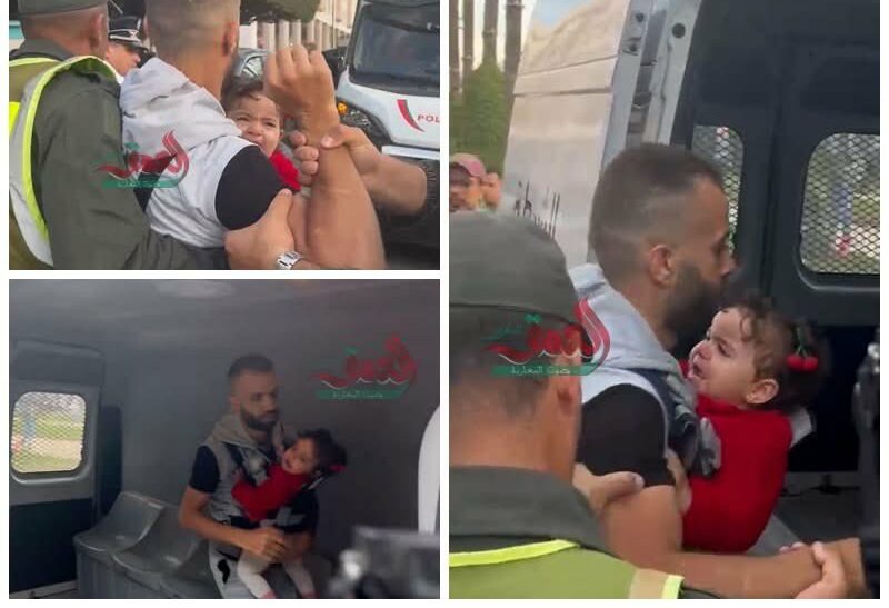 Un homme arrêté avec son bébé